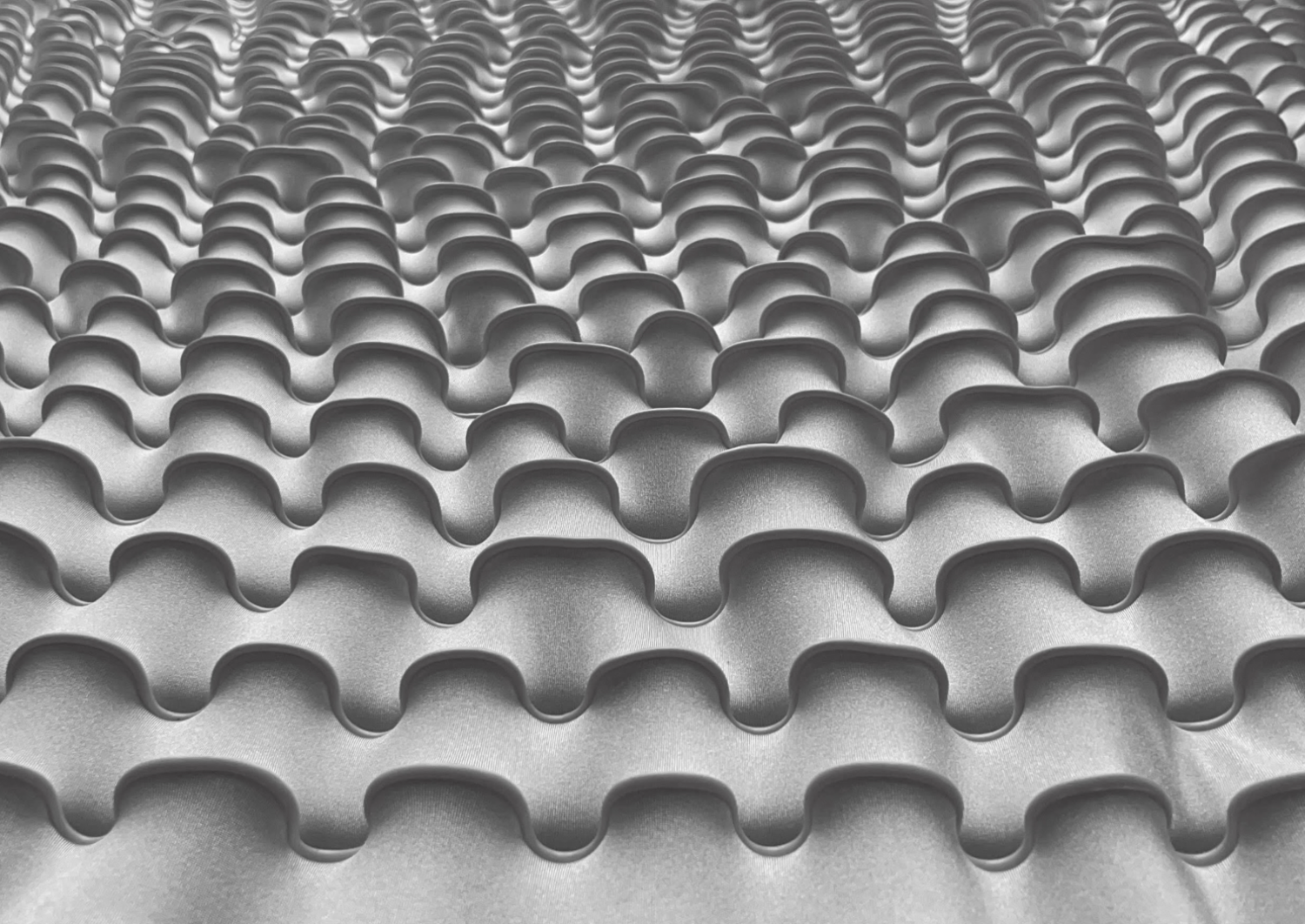 Undulating lines on prestretched textile